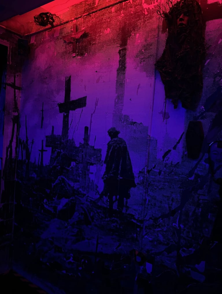 Dark gothic wall art mural with crosses and a silhouette under red and purple neon lighting.