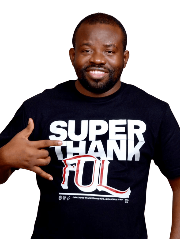 a man with a super thankful black t - shirt - Image of the founder of Radiant Side:  Dr. Olaomo
