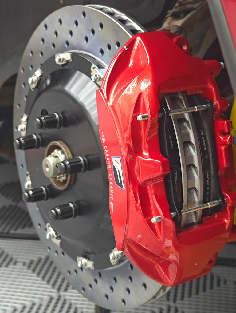 RCF Track Edition rear calipers retrofitted to a MKIV Supra using 380mm rotors