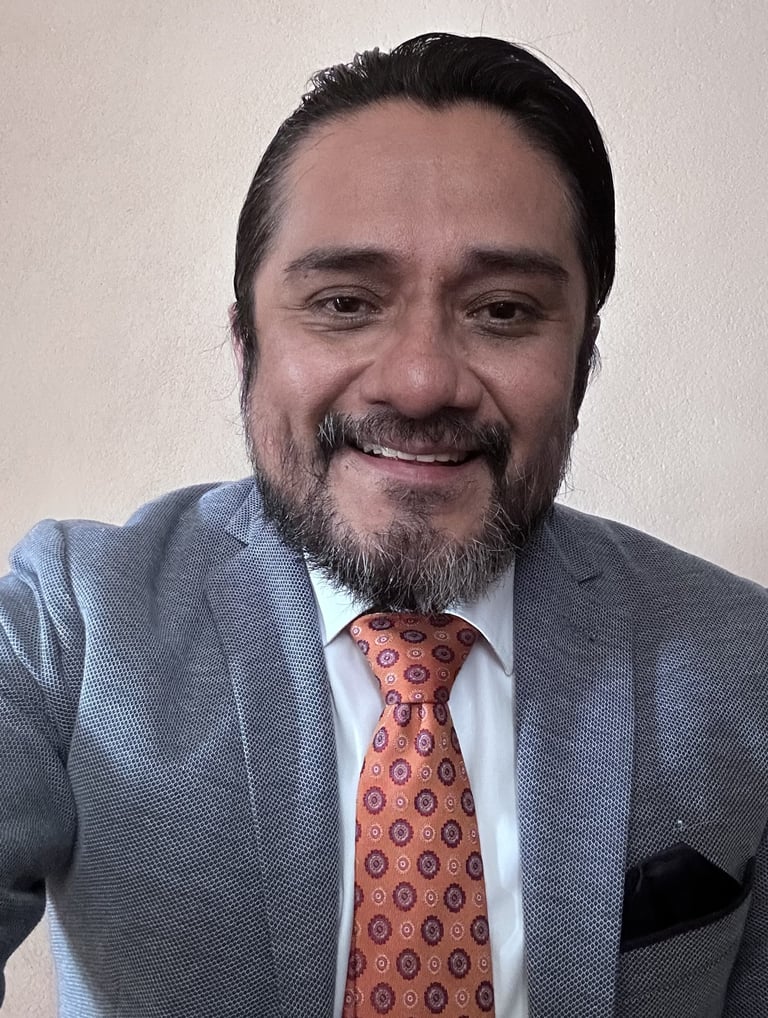 Professional psychologist smiling for a photo in formal attire