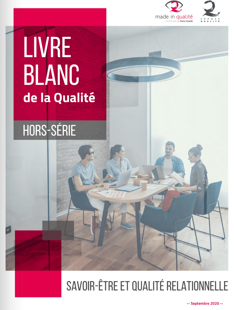 a group of people sitting around a table