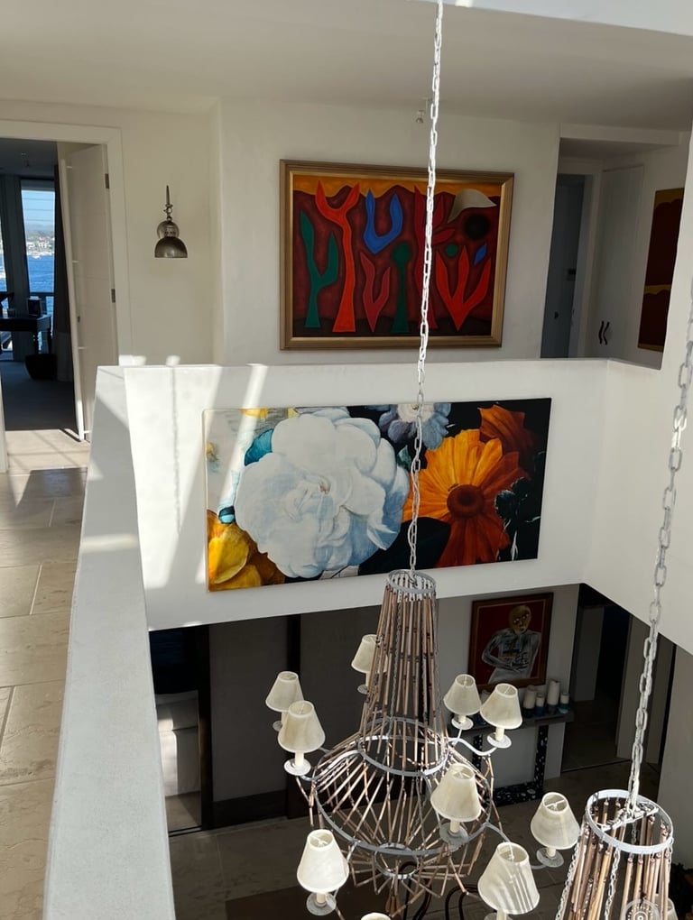 fine artwork installation above a void for one of our clients