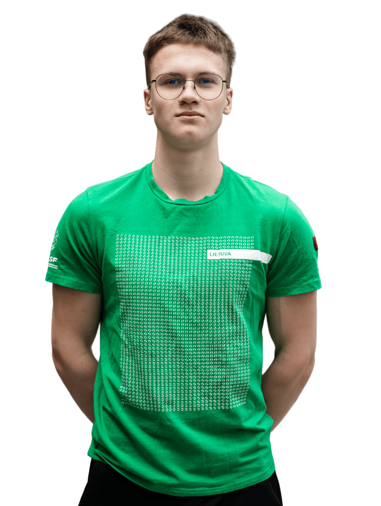 a boy in a green shirt