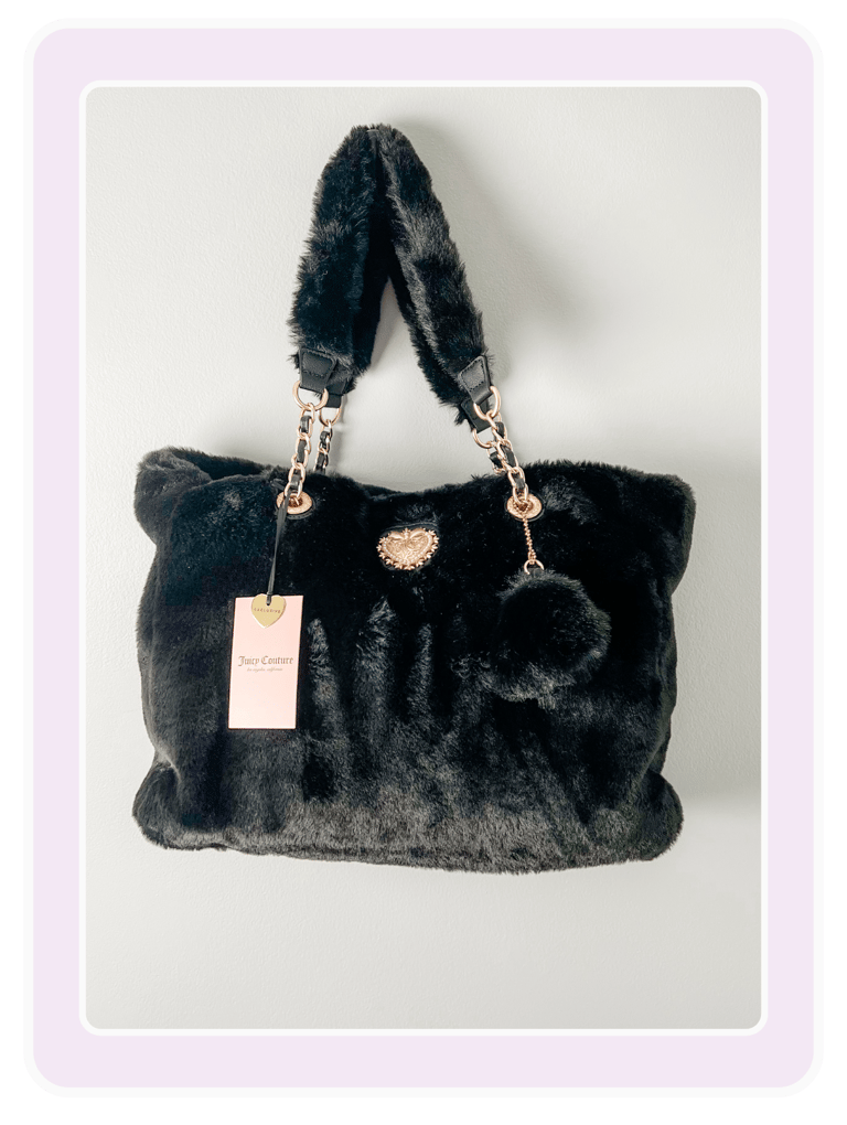 Black Juicy Couture faux fur tote bag with gold chain straps and a crown logo embellishment.