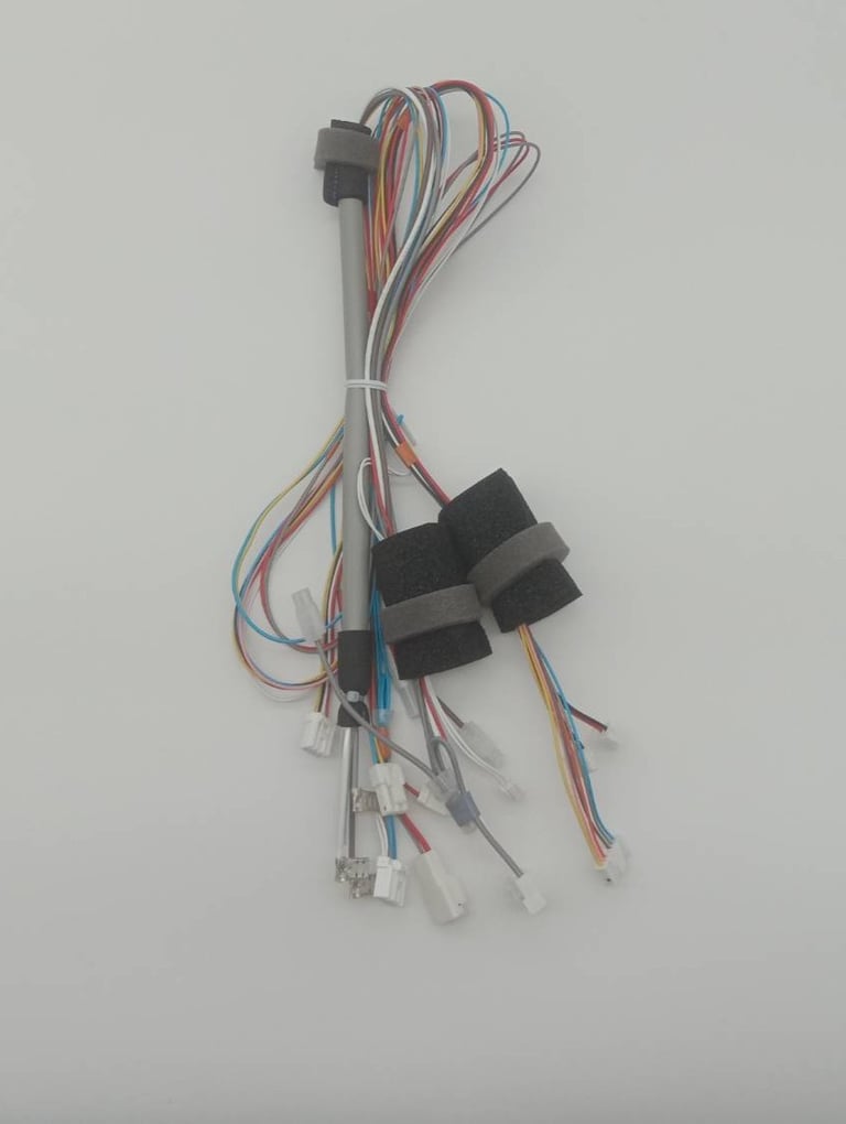 Example of OEM wiring harness which combine many parts ranging from wire, connectors, sponge, binder