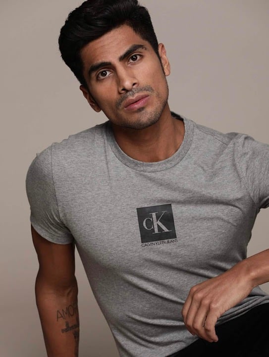 Dany Peña international male model and actor in casual Calvin Klein editorial portrait