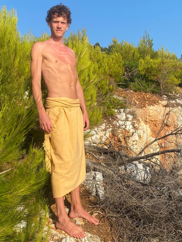 man wearing hemp sarong outdoors on travels