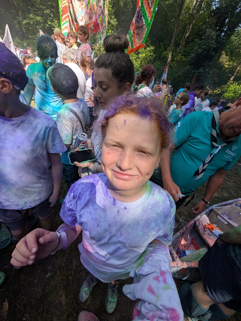 A young scout at a colour run