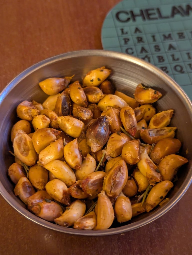 Free corn snack with chilli and rosmary at Chelawasi Public House in Arequipa