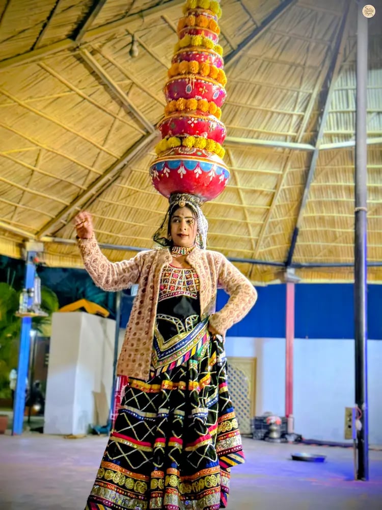 Watch the traditional Chari dance performance at Gulab Garh Jaipur, a vibrant Rajasthani folk dance with fire pots.