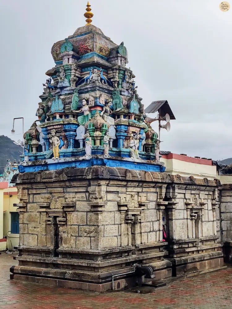 Poombarai Murugan Temple in Kodaikanal with scenic surroundings.