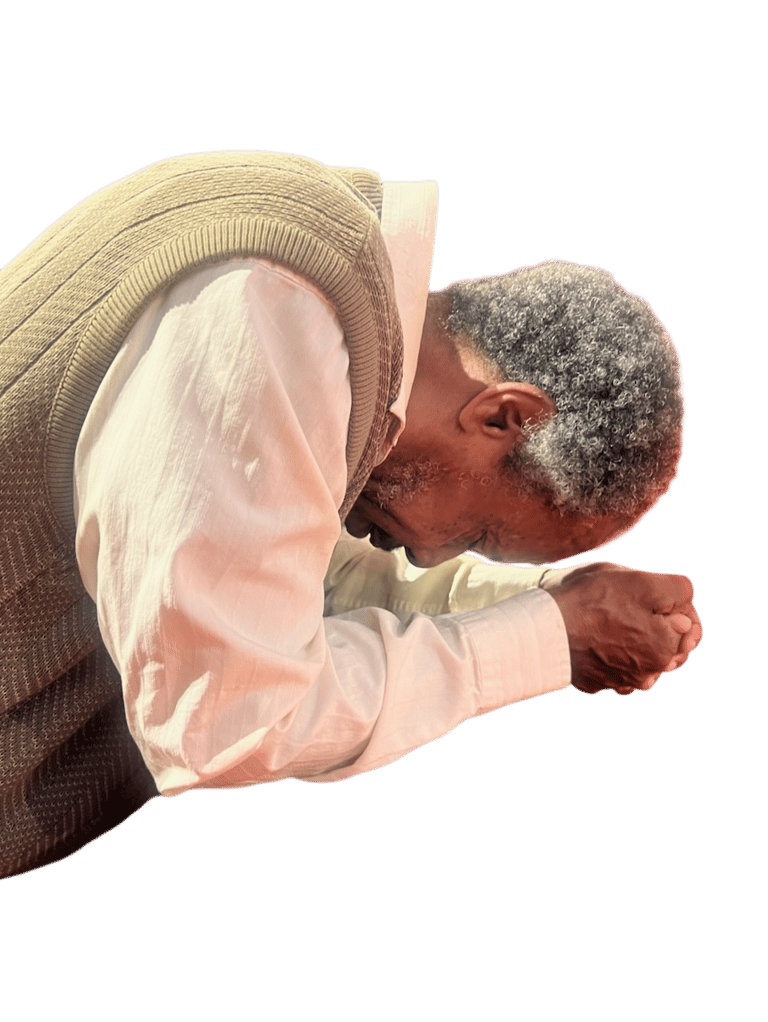 Man kneeling to pray