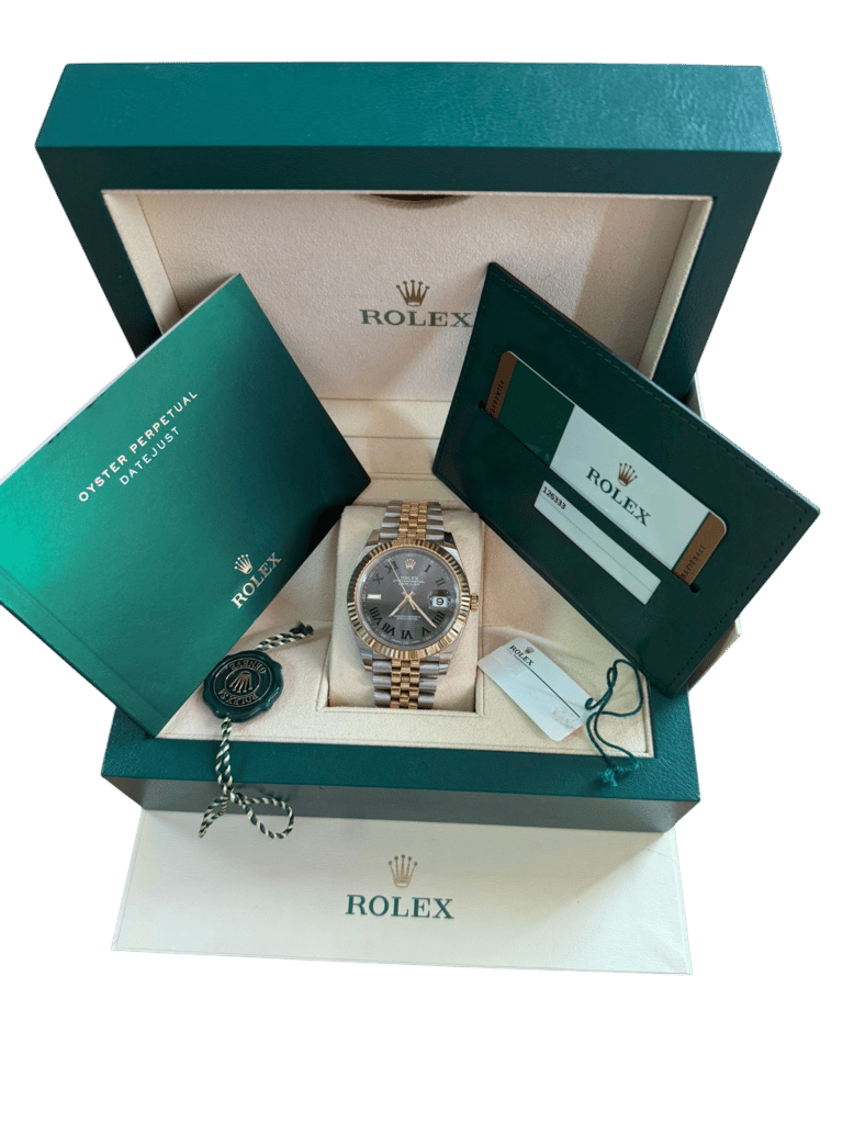 a rolex watch in a box with original receipt and certificate