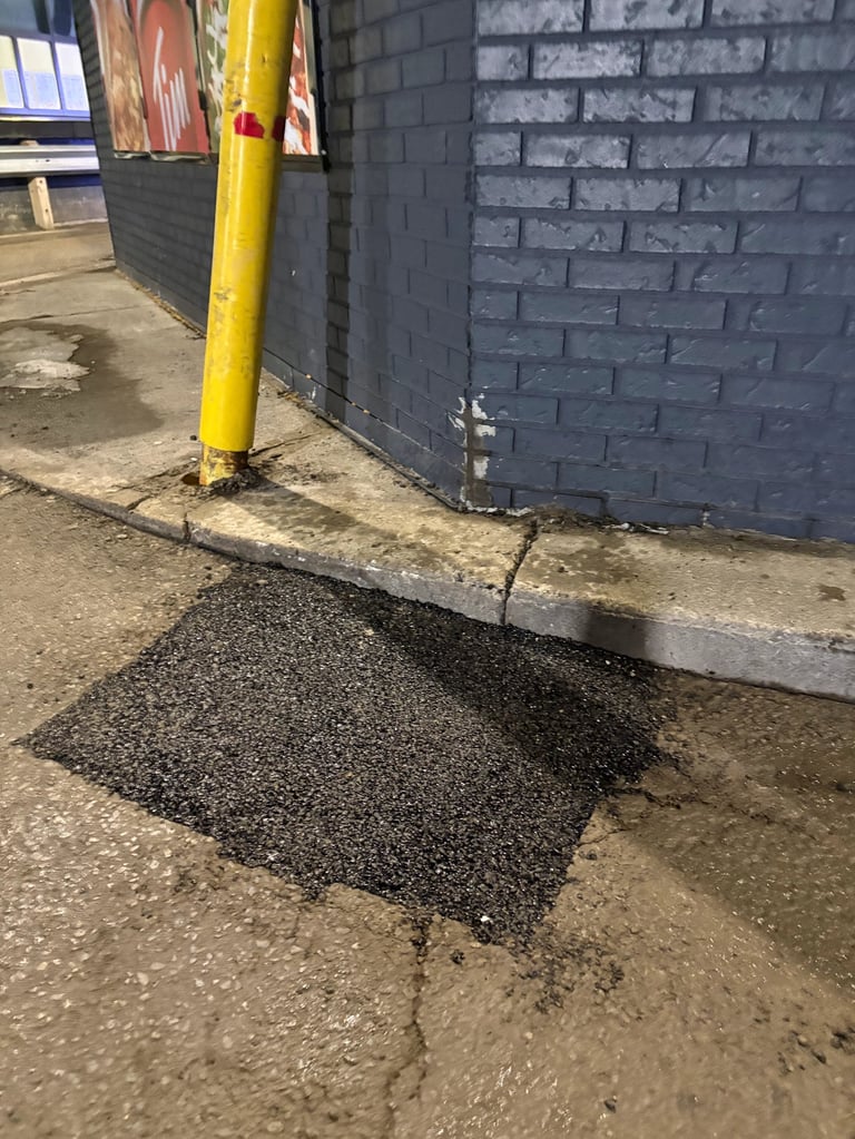 Drivethru Pothole Repair Finished and Compacted