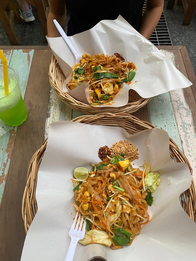 two baskets with food on a table