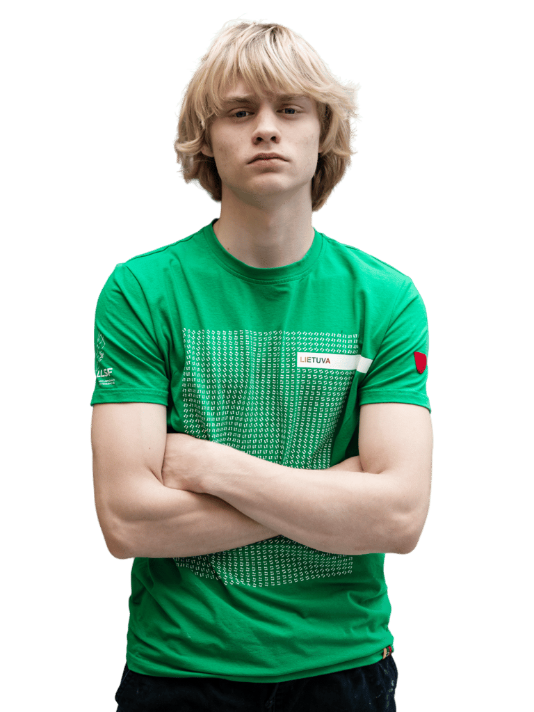 a boy in a green shirt