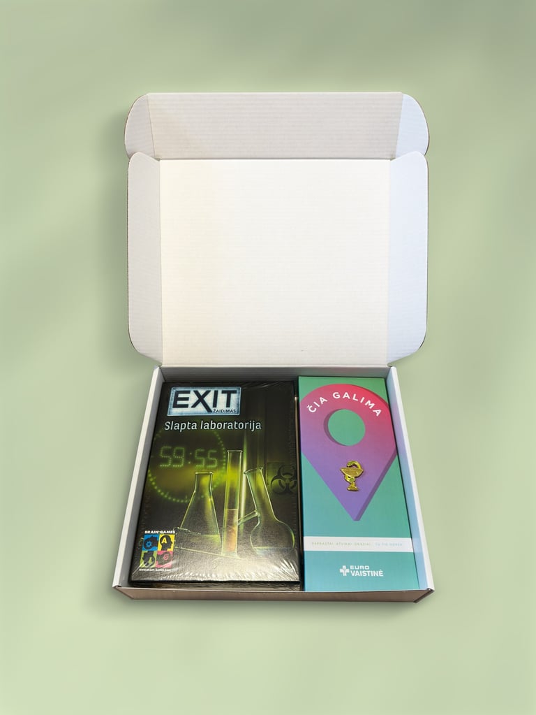 An open cardboard box containing an EXIT board game and a branded Euro Vaistine gift set.