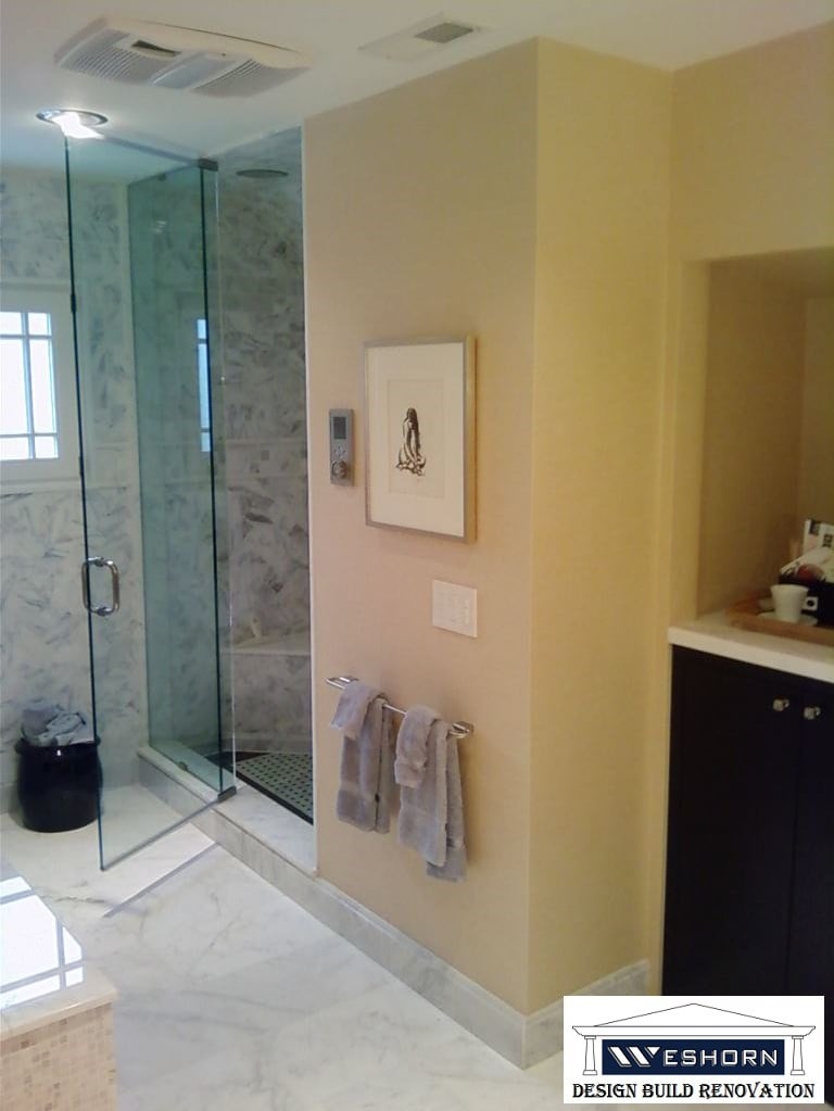 Custom tile installation around shower walls and bathroom flooring in Glenview IL.