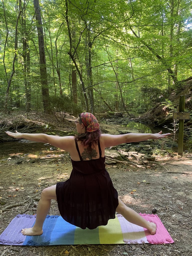 Rachel outdoor and forest with rainbow mat black dress yoga pose