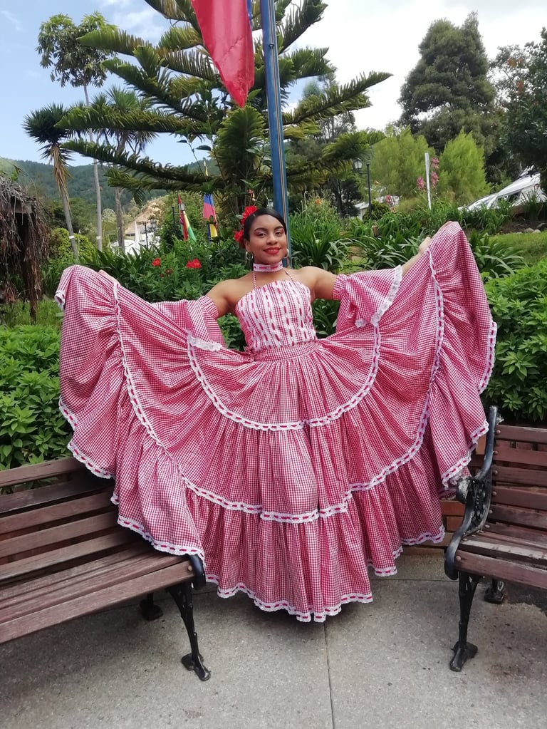A dancer of Cumbia with a traditional dance costumbe