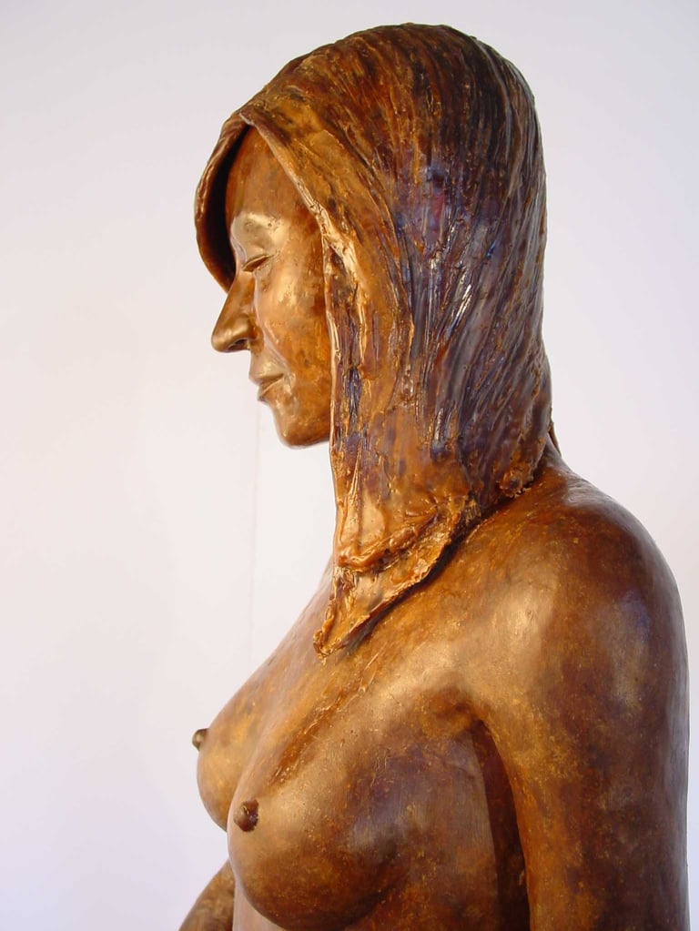 detail of wax model upper torso, hair and face