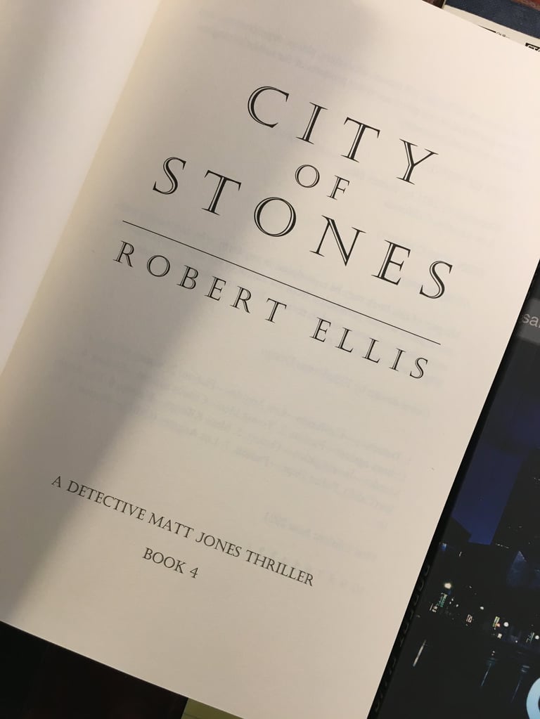 Photo of the title page to 'City of Stones’ by Robert Ellis, Book 4 in the gripping series featuring Detective Matt Jones.