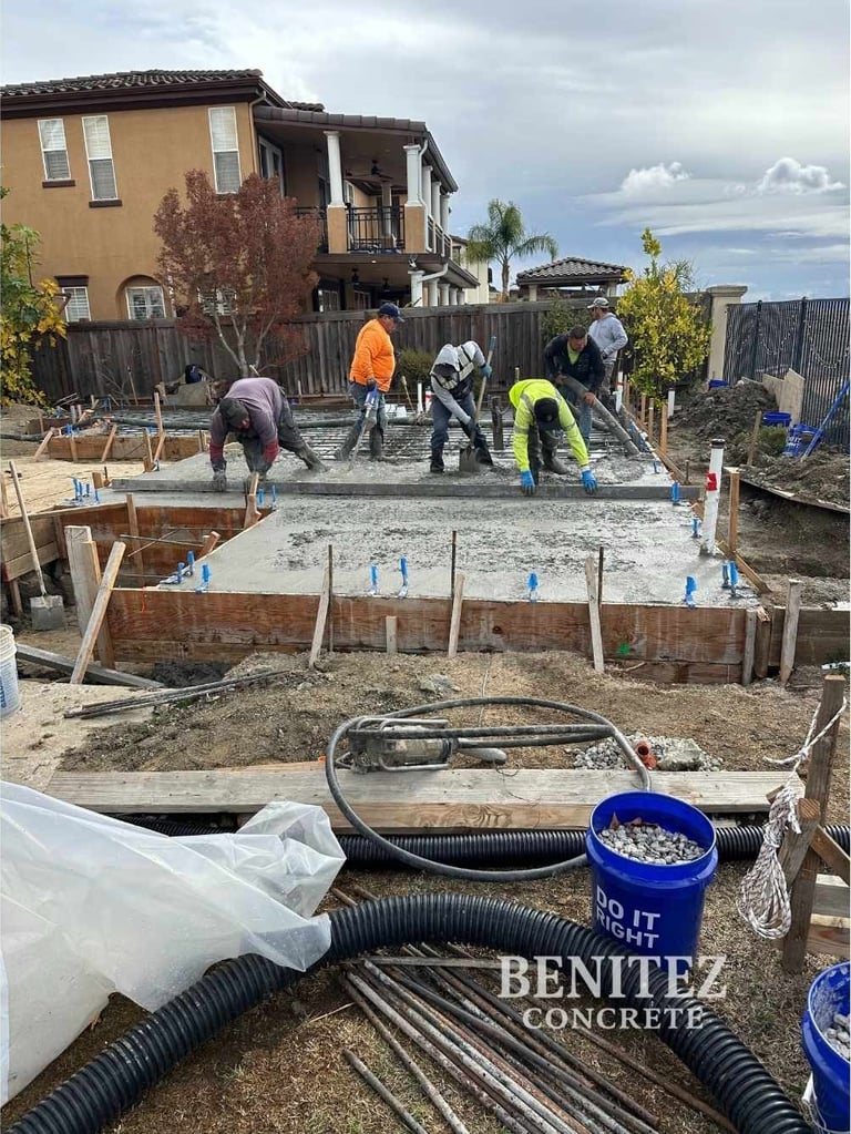 Crew working on concrete adu