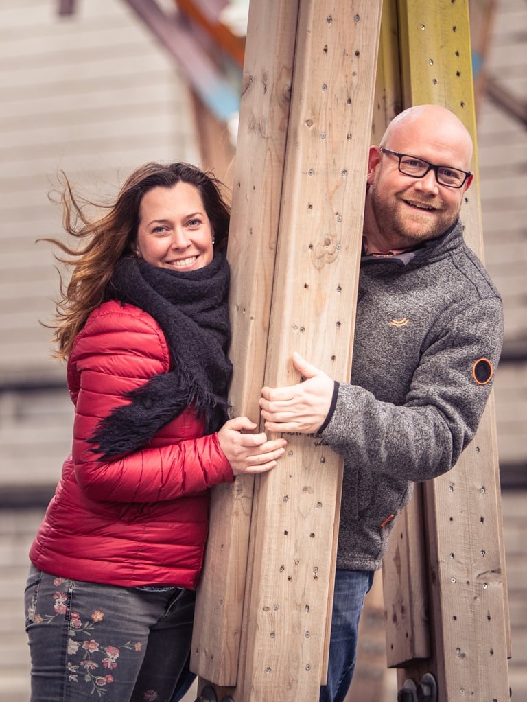 a man and woman standing next to each other