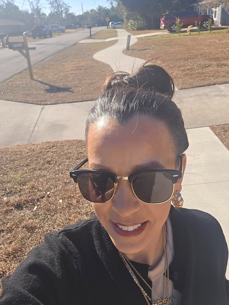 Lifestyle selfie during a sunny outdoor walk focused on confidence and calm