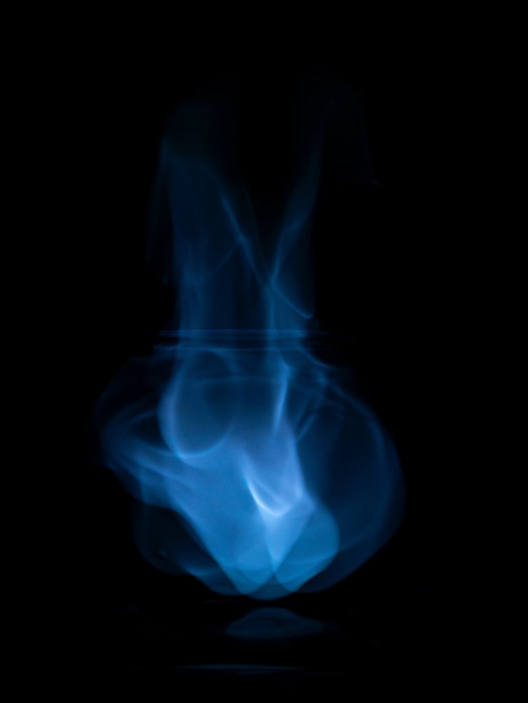 Blue flames mocking a rabbit. Fire in a jar