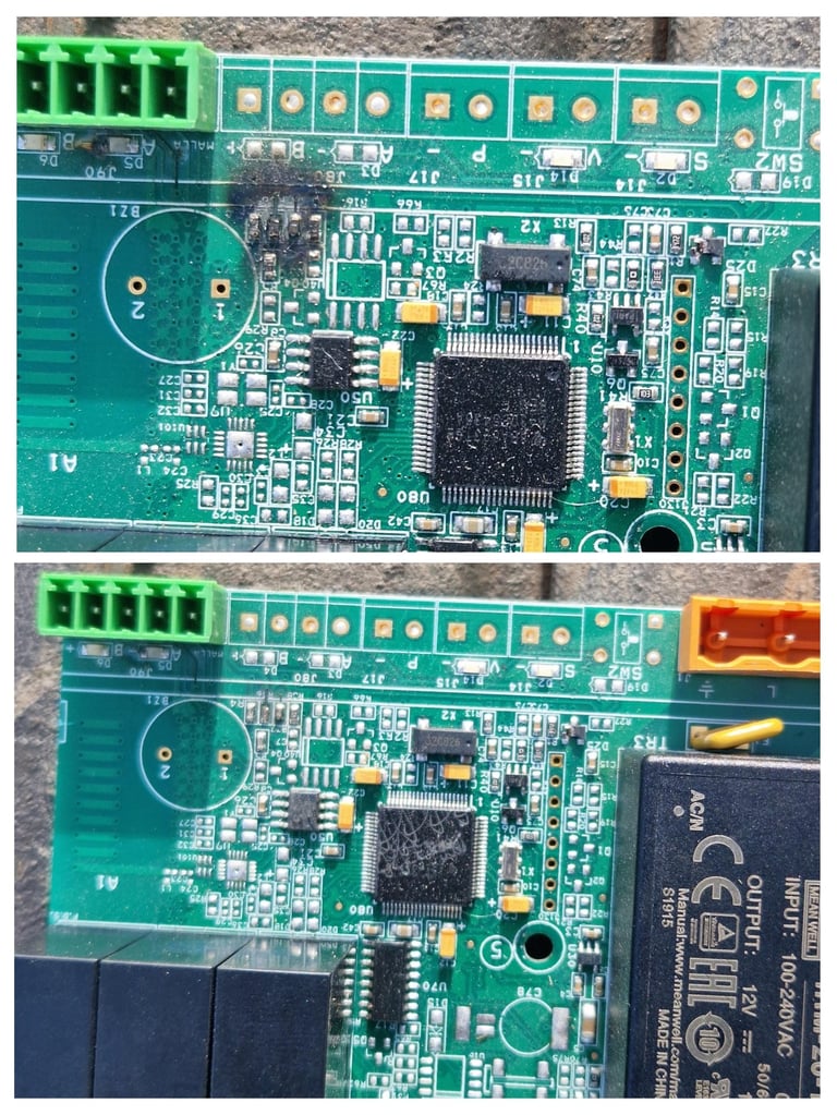                                  Placa de circuito verde dañada que muestra un componente quemado 