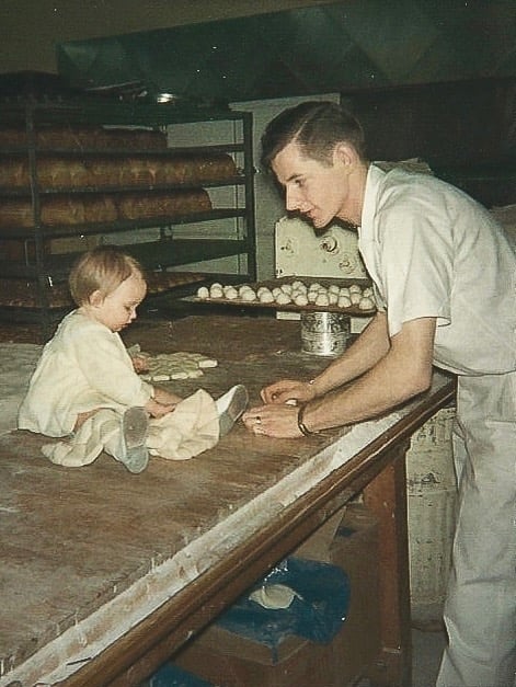 Dad showing me the ropes at the bakery early.
