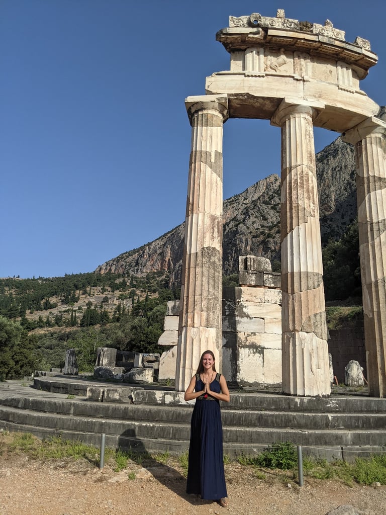 meditation in front of athena temple in delphi greece