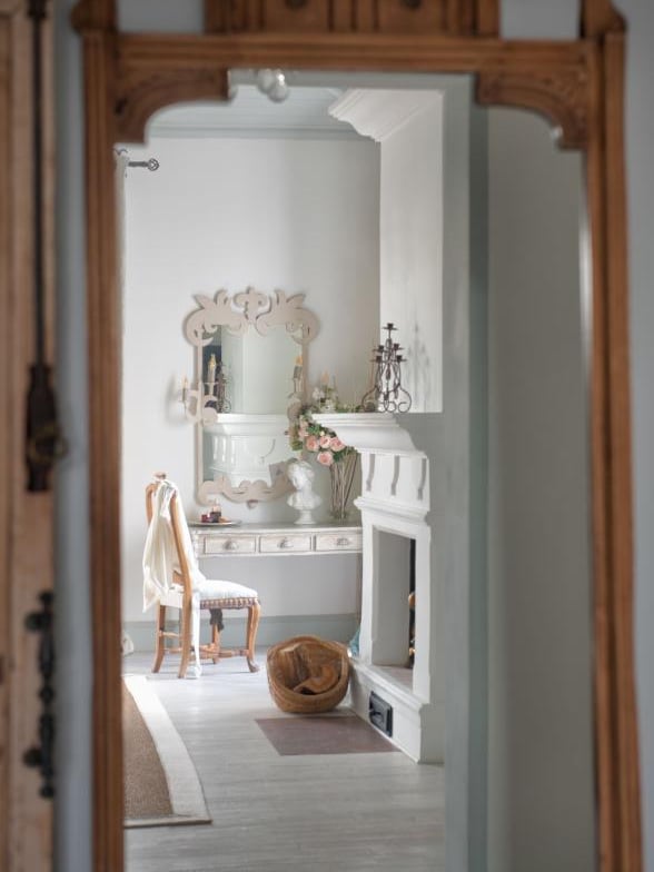 Master Suite at Finca Santa Katerina, showing antique furnitures and a fireplace