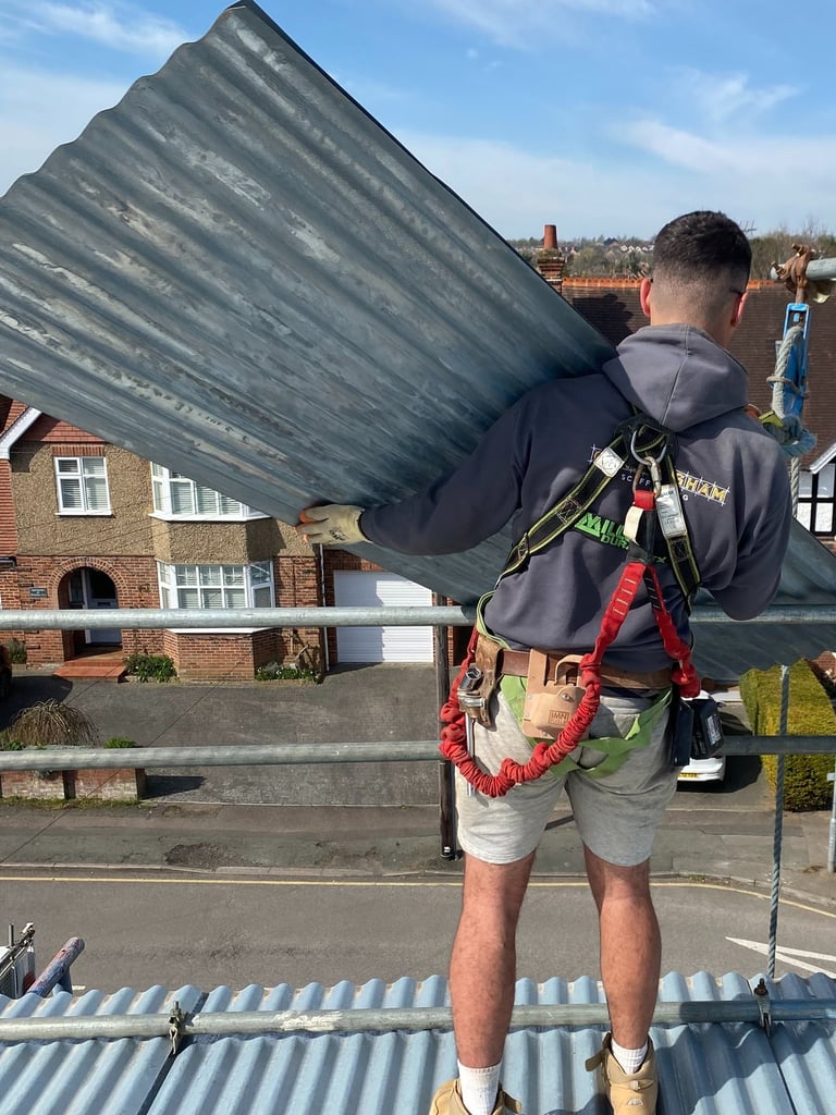 Scaffolder harnessed to scaffolding
