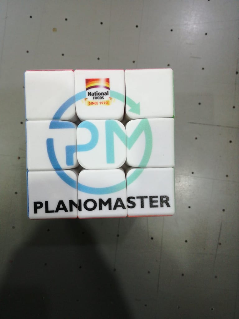 Intricate UV printing on small cubes for corporate promotional items