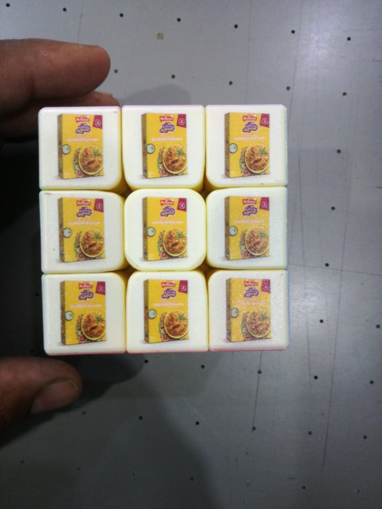 Intricate UV printing on small cubes for corporate promotional items