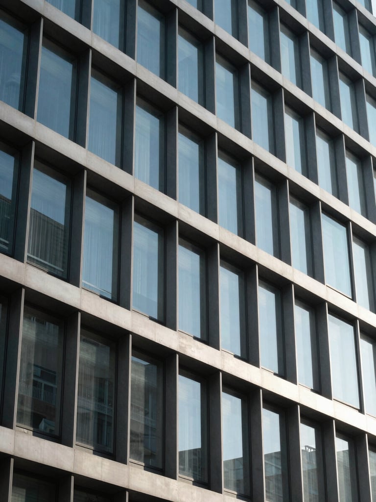 Precise architectural close-up of a glass and steel financial building facade in Madrid, clean geometric patterns, sharp shadows, cool blue daylight reflections.