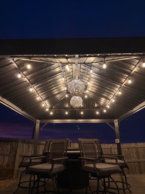 patio string lights in an arbor in Peyton Colorado