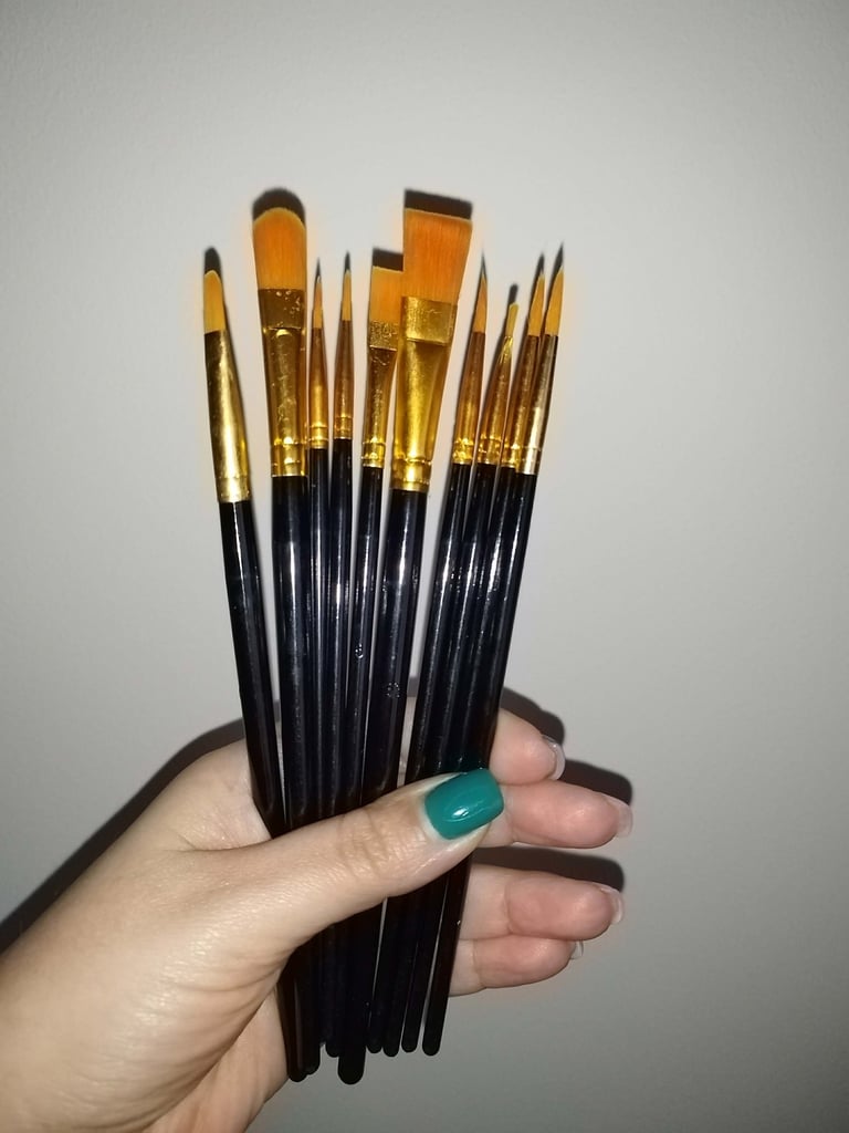Set of 10 black nylon paint brushes in different sizes for acrylic watercolor and oil painting