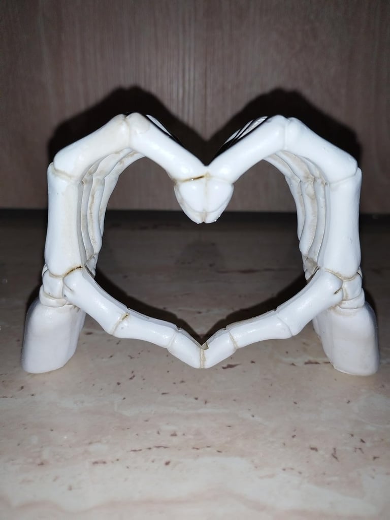 Resin skeleton hands forming a heart shape, Gothic Halloween decoration and romantic figurine 