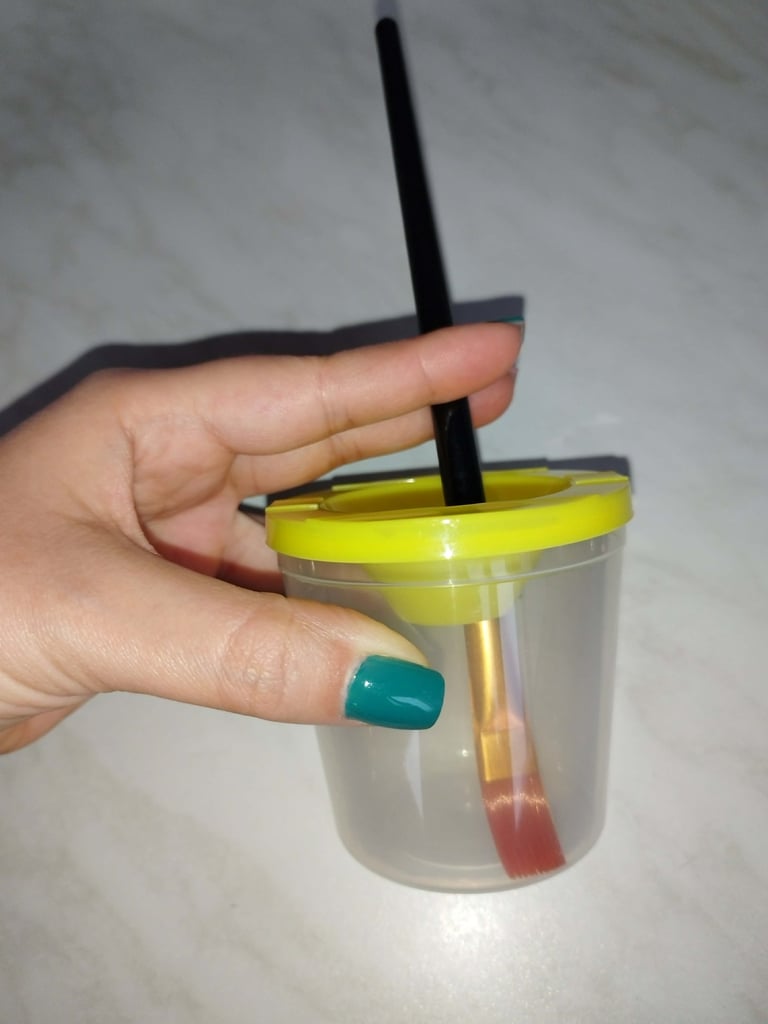 no spill paint cup with lid in bright color for mess free painting and art projects