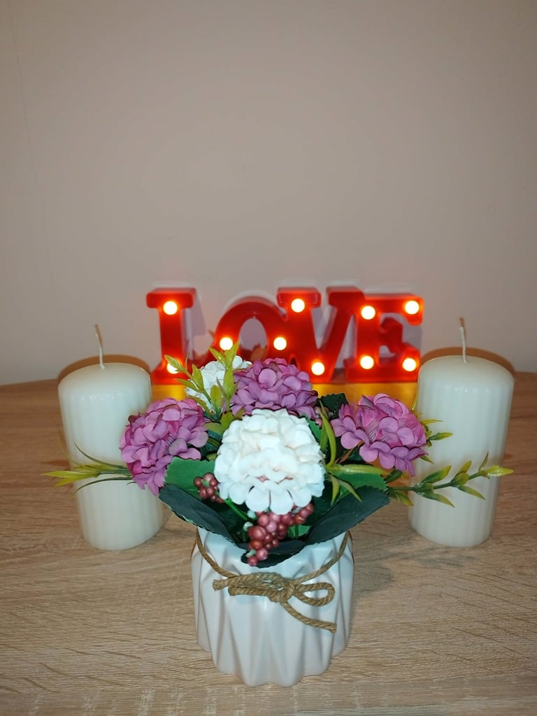 White artificial hydrangea bouquet in ceramic vase, silk flower decoration for table, home, office