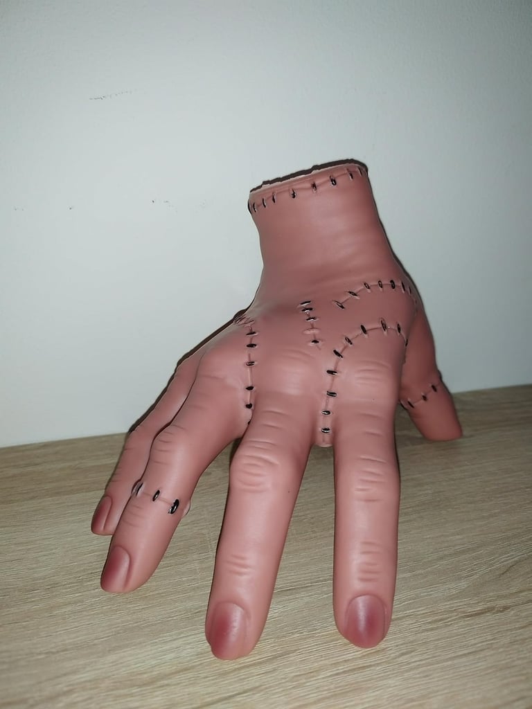 Realistic latex “Thing” hand from the Addams Family for Halloween décor, cosplay, and playful scares