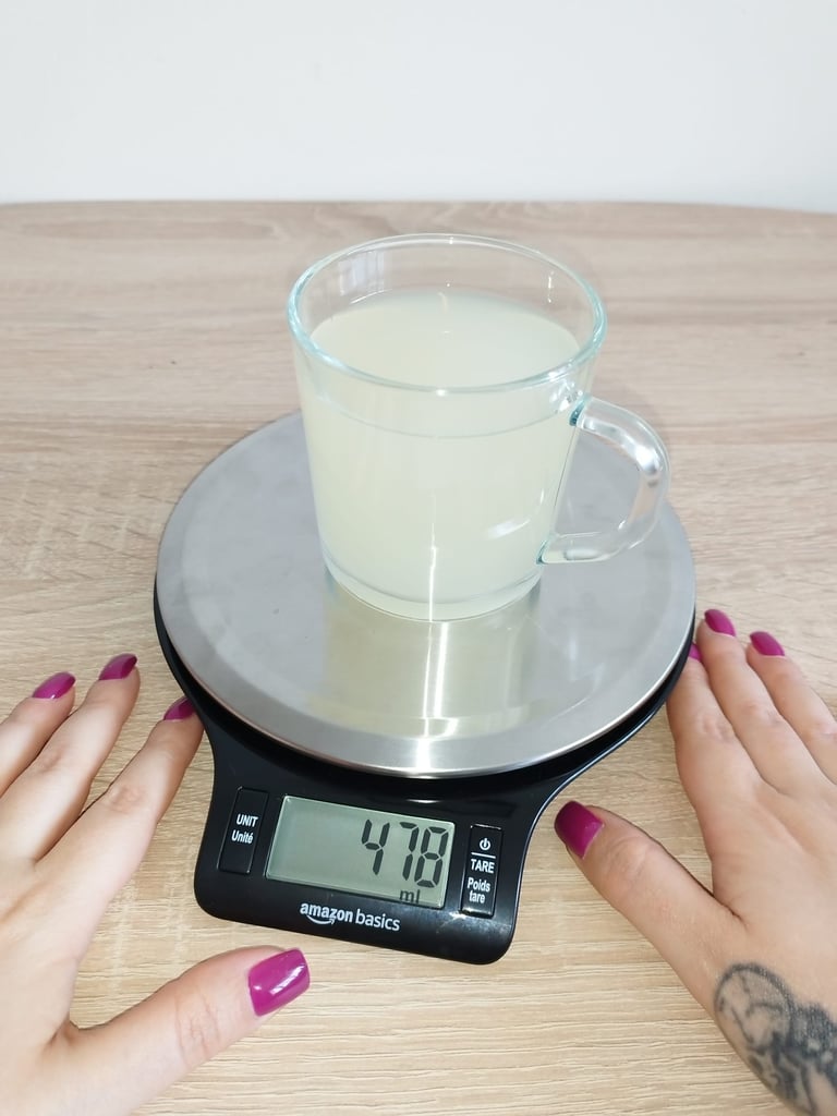 Amazon Basics digital kitchen scale with stainless steel weighing platform and LCD display
