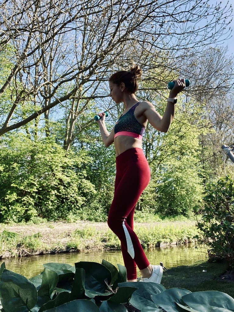 a woman in a sports bra top and leggings