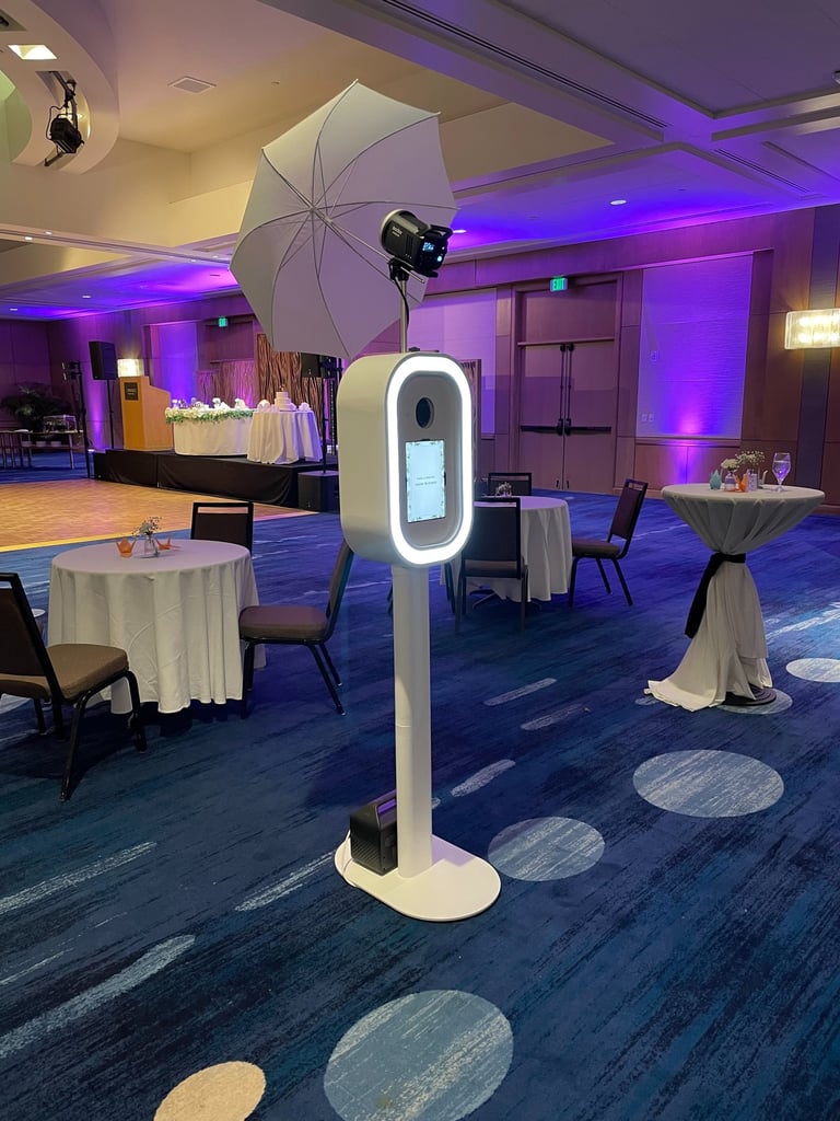 a table with a white umbrella and a white umbrella