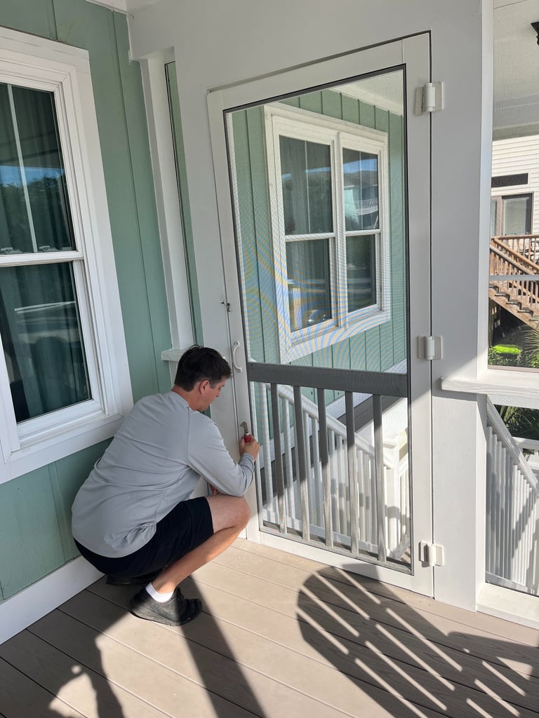 Professional screen door repair services for a damaged entryway in Charleston