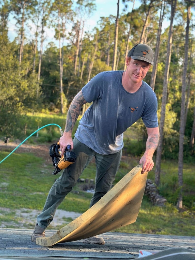 owner performing roof repair