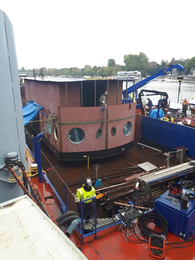 Portholes in a Barge building yard